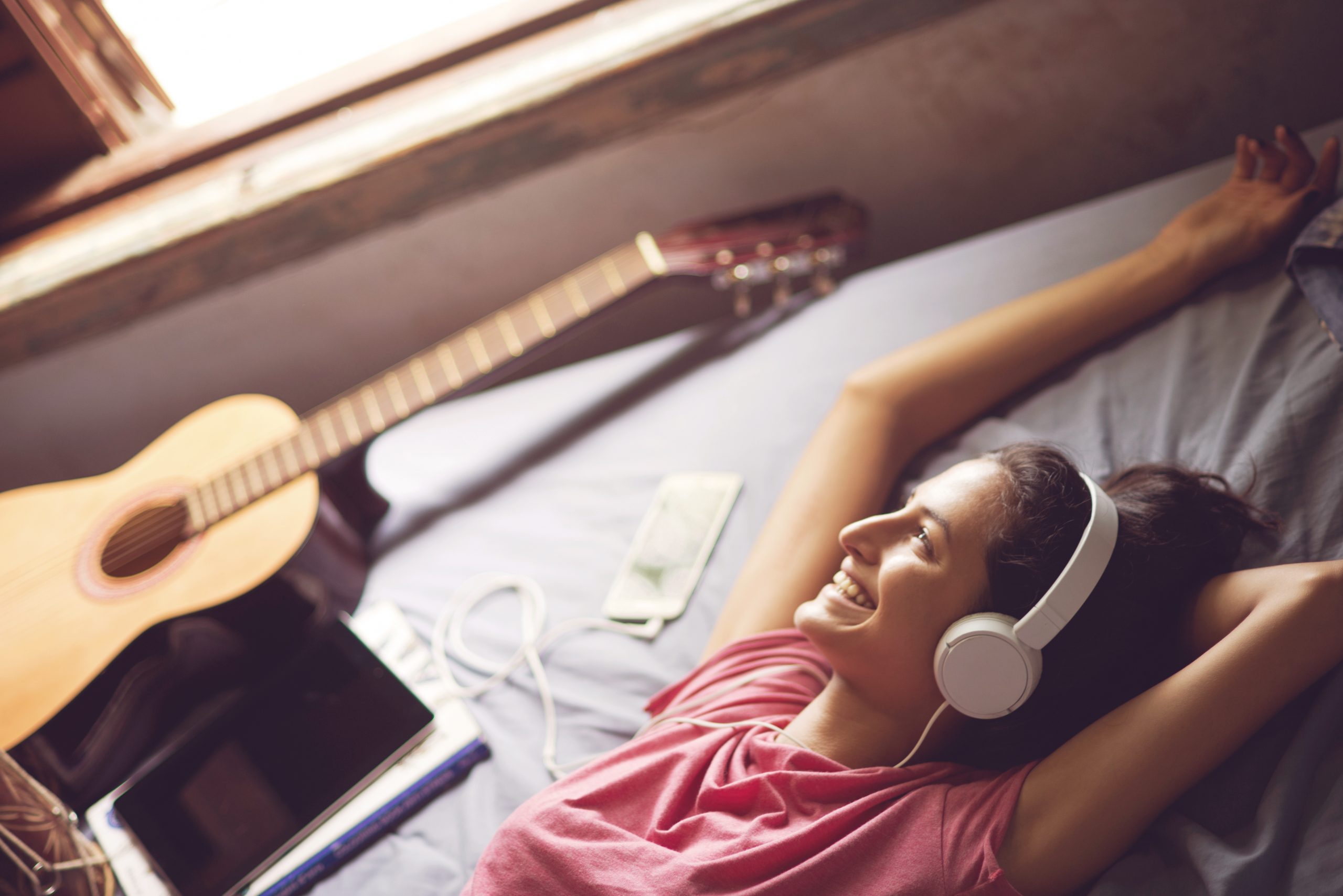 How to make music. Woman Listening to Music.